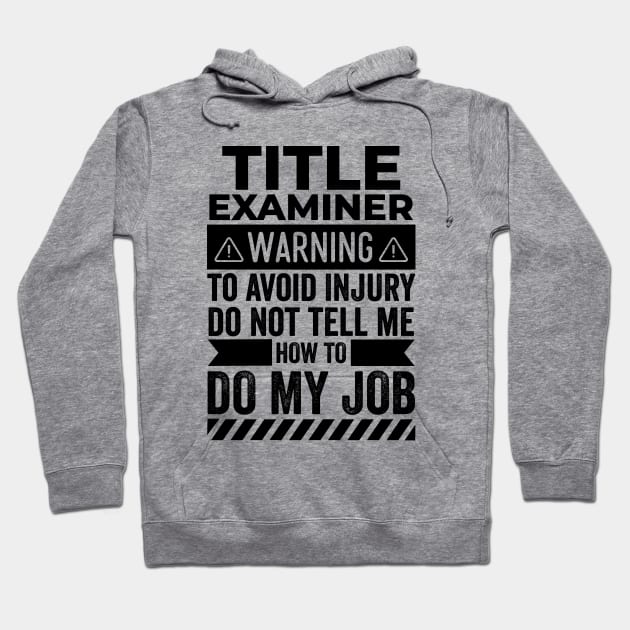 Title Examiner Warning Hoodie by Stay Weird